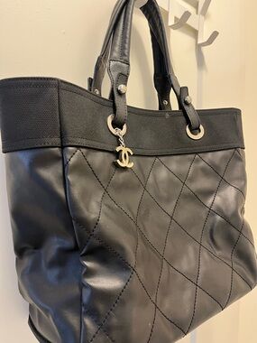 Black CHANEL Quilted coated canvas Tote Bag with silver Charm